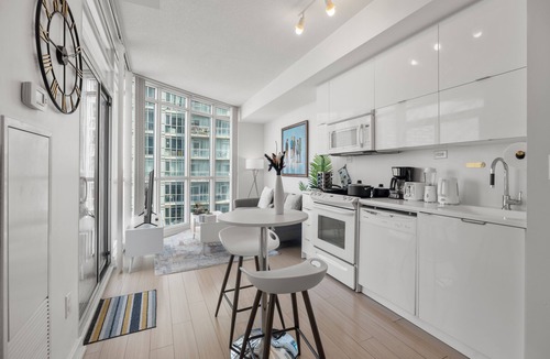 CityPlace Condo | 1BR 1 Bath 3 Guests Parking Balcony Near CN Tower Downtown—By Hostia