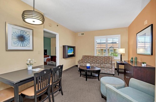 Florida Central Atlantic Coast Apartment | 1BR 2 Queens Apt-Hotel with Pool & Hot Tub, near Disney & Universal Studios!