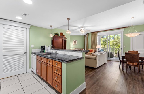 Baytowne Wharf Condo | 1BR Baytowne Condo with Lush Resort View! Tram, Walk to Wharf, Pool & Hot Tub