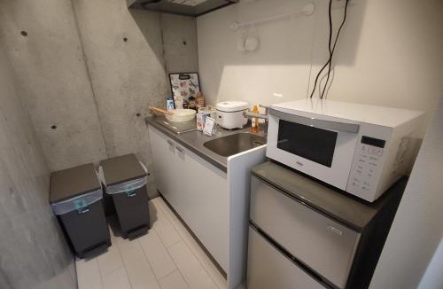Higashinippori Apartment | 202Room,7-minute walk from Uguisudani Station located on the 2nd floor of an apartment-style building Twin room No elevator