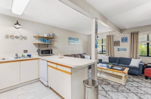Caine Woods Condo | 2BR 2BA condo with parking, pool, walking distance to the beach & restaurants.