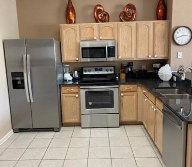 Windsor Hills House | 3 BR 2 Miles to Disney, pool, free WiFi and more townhouse