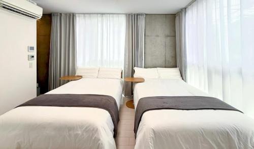 Higashinippori Apartment | 301Room,7-minute walk from Uguisudani Station located on the 3nd floor of an apartment-style building Twin room No elevator