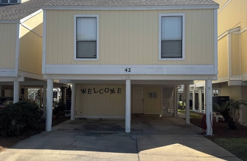 Holiday Isle Villa | 3BR Villa in Sandpiper Cove with private beach access and multiple amenities.