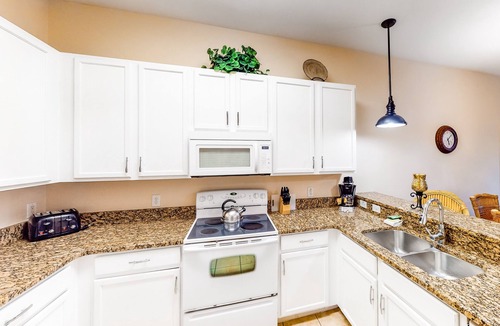 Bahama Bay Condo | 3rd floor condo w/basketball court, balcony, gym, sauna, shared pools