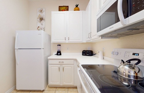 Bahama Bay Condo | 3rd floor condo w/sauna, shared pools, restaurant, gym, balcony