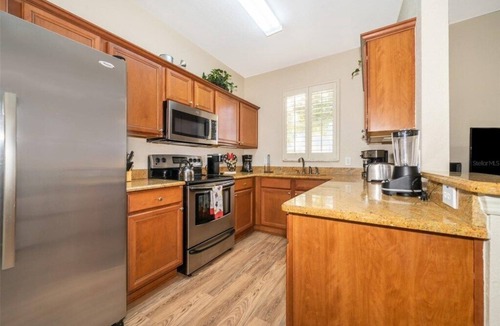 Regal Palms House | 4 Bed 3 Bath Resort Town Home - Enjoy Pool & Amenities - close to Disney & Golf!