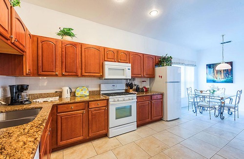Crescent Lakes House | 4 Bedroom Home in Gated Area on the Lake withSolar Heated Large Pool with Spa