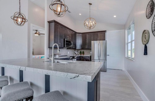 Mid Island House | 5545 Palmetto Street by Coastal Vacation Properties