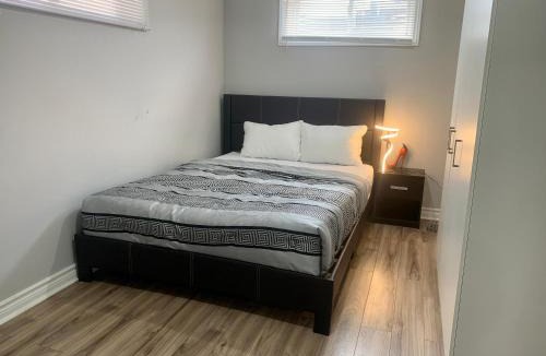 Guelph House | A bedroom in a basement