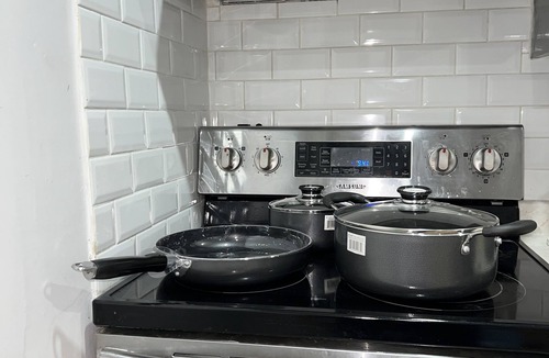 West Hill House | A cozy fully furnished apartment. Sleeps six. Close to all amenities.
