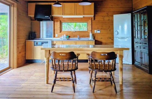 Yawatano House | A log cabin vacation rental nestled on a hill in I/Ito City Shizuoka