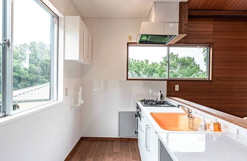 Yawatano House | A rental villa with a large garden that doubles as a dog run surrounded by trees/Ito Shizuoka