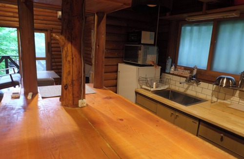 Yamanakako House | A unique log house surrounded by nature with a wood stove and a private sauna hut basementloft av/Minamitsurugun Yamanashi