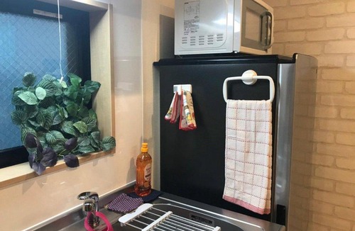 Kitaotsuka Apartment | A0 Otsuka Bovine Family House