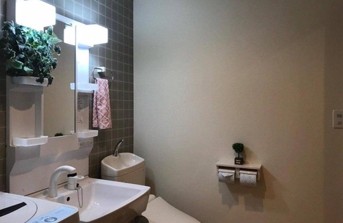 Kitaotsuka Apartment | A0 Otsuka Bovine Family House