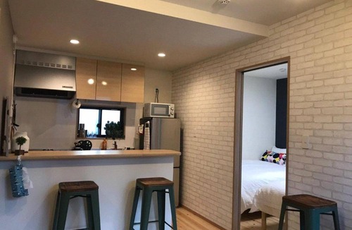 Kitaotsuka Apartment | A0 Otsuka Bovine Family House