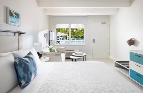 New Town Hotel | All-Day Fun in Key West |Lawn Games, Pools & Cabanas, Karaoke Fun, Free Shuttle