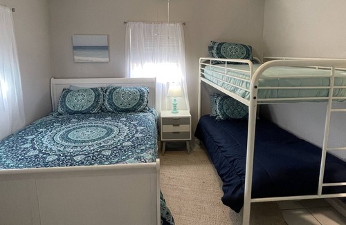 Crescent Beach Cottage | Beach cottage walking distance to the sugary white sand!