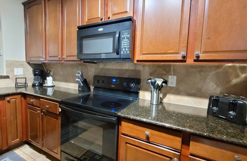 Davenport Condo | Beautiful 4bed condo w full size baby crib, resort amenities, near Disney