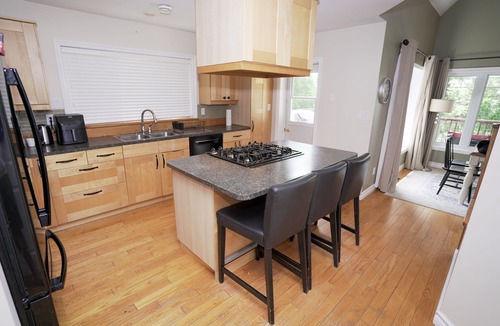 Seguin Cottage | Beautiful 5 bedrooms waterfront cottage sits on a private 4 acres wooded lot!