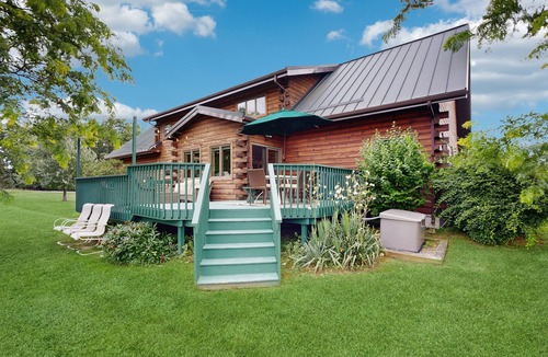 Dundee House | Beautiful lake view home with decks, grill, soaking tub & fireplace