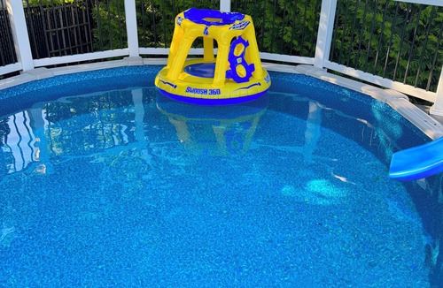 North Massapequa House | Beautiful RYDER CUP home with heated pool outdoor dining/bar just minutes away