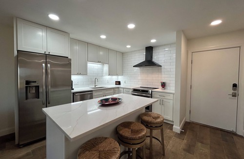 Upper Grand Lagoon Villa | Beautiful sunset waterfront 1st floor marina villa. Quiet safe gated community.