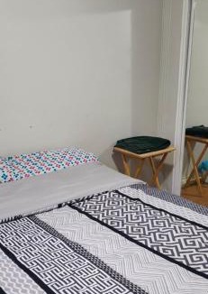 Mississauga House | Bedroom with double bed