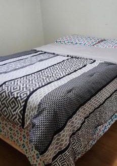 Mississauga House | Bedroom with double bed