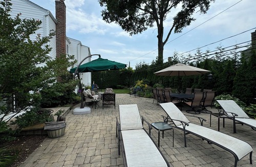 Woodbury House | Bethpage Black Ryder Cup Retreat/Spacious 4 bedroom w heated in-ground pool