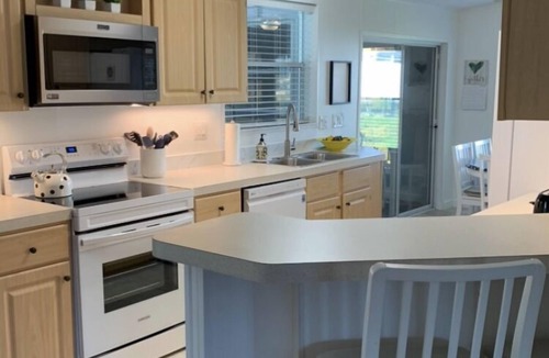 Vista del Lago House | BLESSED NEST: 5mi to Disney, resort amenities, sleeps 8, gated, free golf cart