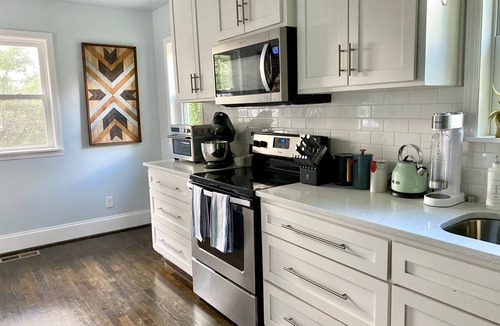 Forest Park House | Blue Door Walk to Avondale Dog-friendly w Yard