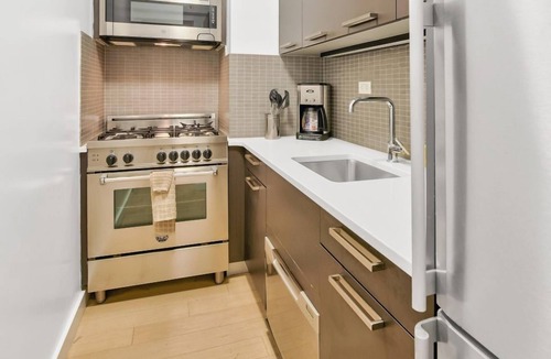 Tudor City Condo | Bright & Spacious 1BR Retreat at The Nash