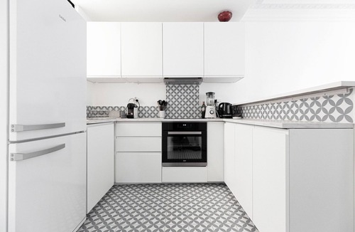 Ternes Apartment | Bright Whites on Pereire Promenade, by Veeve