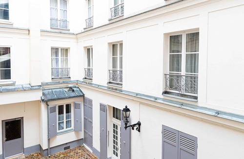 Ternes Apartment | Bright Whites on Pereire Promenade, by Veeve