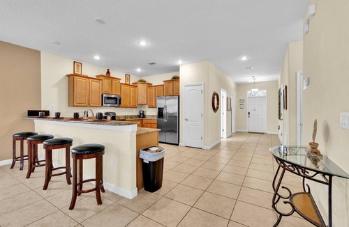 Davenport House | Championsgate Resort 8 Bedroom Pool Home w Theater Room