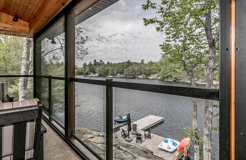 Georgian Bay Cottage | Charming 3 bed, 3 bath log cabin on Six Mile Lake. Stunning Muskoka room!