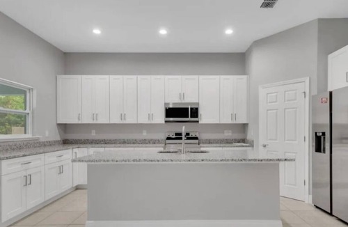 Port Malabar House | Charming 3-bedroom house in Palm Bay with AC, WiFi