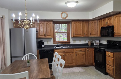 Howard House | Charming 3-bedroom house in gorgeous Howard with AC and fitness room
