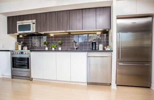 CityPlace Apartment | Chic Corner 2 Bedrm CN Tower Suite/Terrace