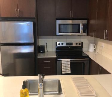 Wellington Place Apartment | Chic Toronto Blue Jays Getaway
