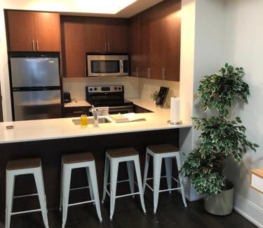 Wellington Place Apartment | Chic Toronto Blue Jays Getaway