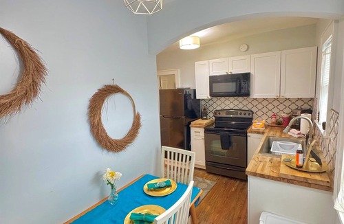 Historic Uptown House | Close to all with a King-bed! Bikes included