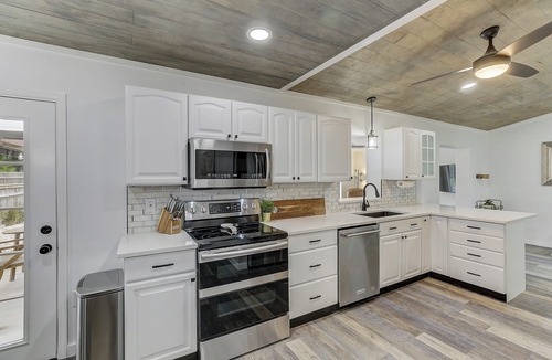 Quail Run House | Coastal Break Family Oasis - Heated Pool & Fire Pit - Near Beaches & Downtown