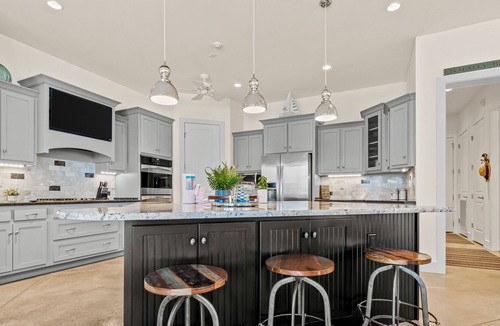 Emerald Waters Village House | Coastal charmer with huge screened patio, pool access, & W/D - minutes to beach