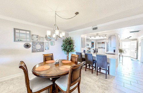 Port Canaveral Condo | Comfy condo in great location with pool, covered balcony, fast WiFi, W/D & AC