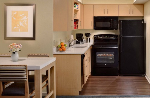 Somerset Hotel | Cook, Relax, and Play | Family Suite with Swimming Pool