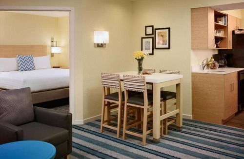 Somerset Hotel | Cook, Relax, and Play | Family Suite with Swimming Pool