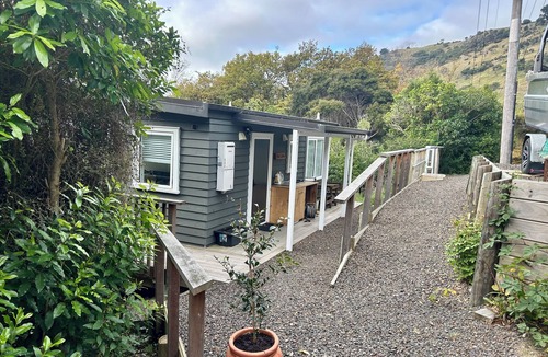 Little Akaloa Cabin | Cosy cabin style bach, immersed in native bush, in beautiful Banks Peninsula